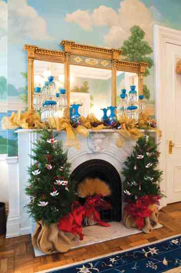 Our sister publication, Mother Earth News, adorned the Jackson Sitting Room's marble fireplace with a bushel of heirloom wheat and trees covered in peace dove cookies bearing flags of the world.